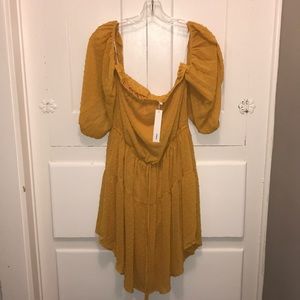 Adorable off the shoulder mustard yellow dress.